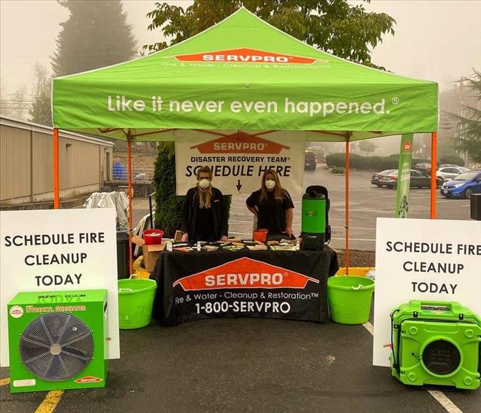 SERVPRO tent with employees and gear set up at job fair