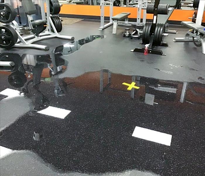 Water on the floor of a gym in Auburn, WA