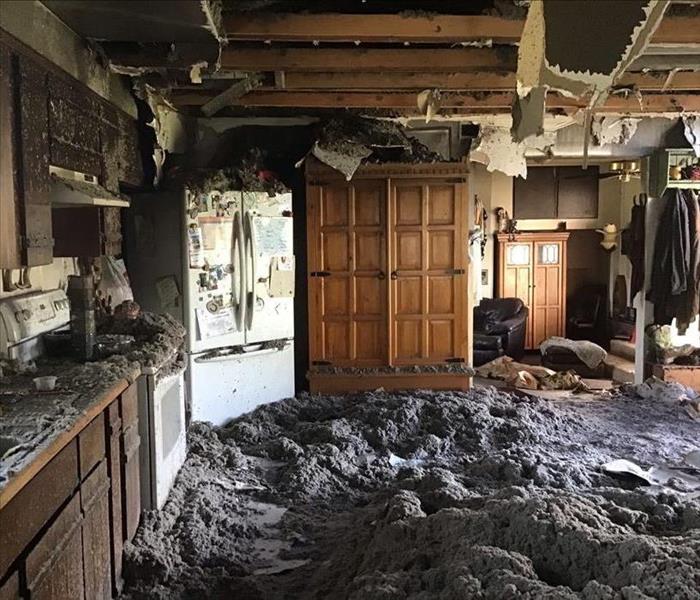 Severe water damage causes the kitchen ceiling to collapse in Enumclaw