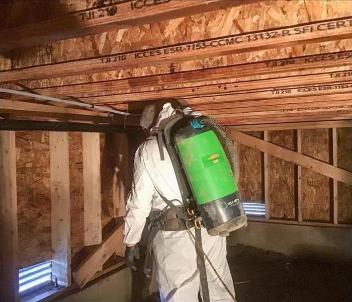 SERVPRO technician checking for mold after a flood